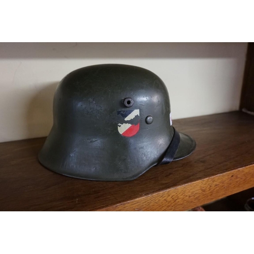 1807 - A German Transitional helmet, having stamp to interior dated 1936, and numbered R2020N.... 