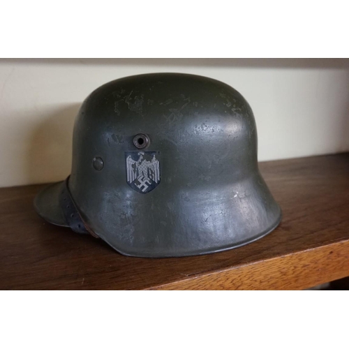 1807 - A German Transitional helmet, having stamp to interior dated 1936, and numbered R2020N.... 