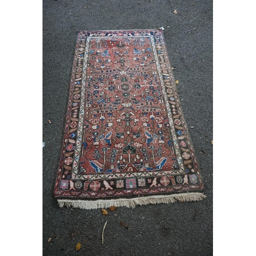 1064a - A village Hamadan rug, 202 x 107cm.