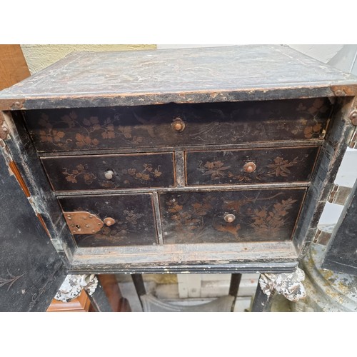 1171 - A small 19th century Japanese lacquer table cabinet, on associated antique stand, the whole 103... 