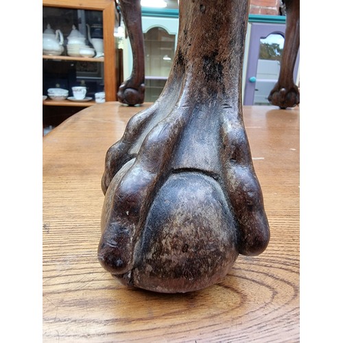 1161 - A 1930s, 18th century style, carved walnut cabriole leg stool, on ball and claw feet, 61cm wide, (la... 