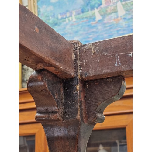 1161 - A 1930s, 18th century style, carved walnut cabriole leg stool, on ball and claw feet, 61cm wide, (la... 