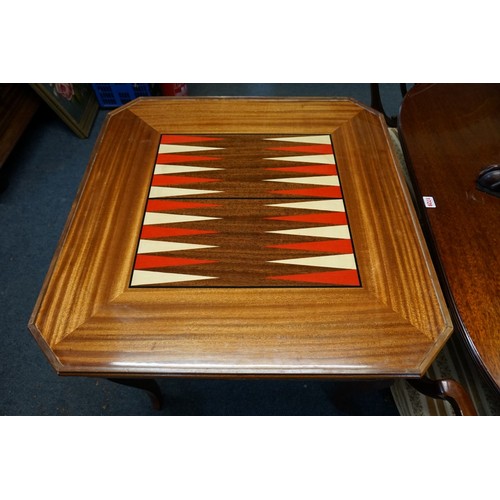 1275 - An Italian walnut and marquetry games table, incorporating backgammon and chequerboards and further ... 