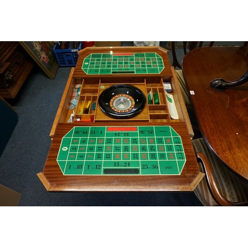 1275 - An Italian walnut and marquetry games table, incorporating backgammon and chequerboards and further ... 