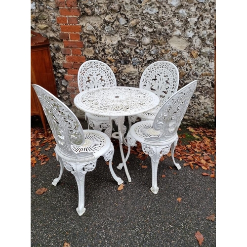 1001 - A white painted aluminium garden table; together with four matching chairs. ... 