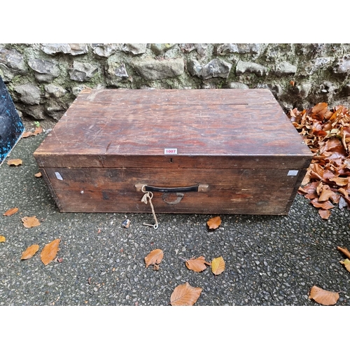 1007 - A wood box containing a quantity of old tools.