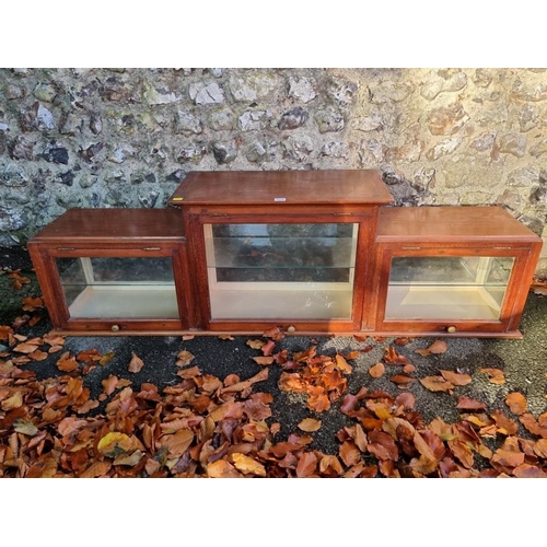 1010 - An Edwardian inlaid display cabinet, 157cm wide x 29cm deep x 49cm high.