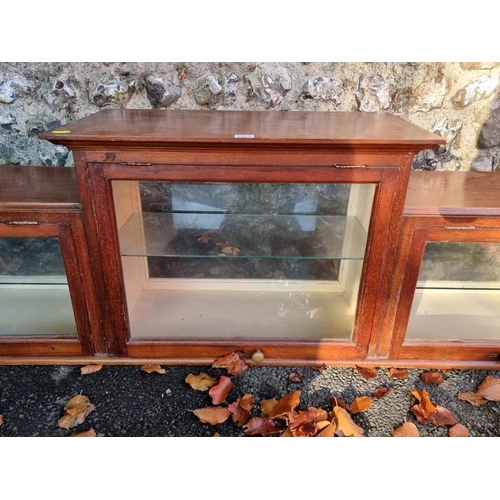 1010 - An Edwardian inlaid display cabinet, 157cm wide x 29cm deep x 49cm high.