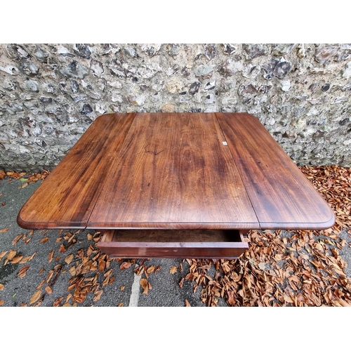 1023 - A William IV mahogany pedestal Pembroke table, 118cm wide when open.