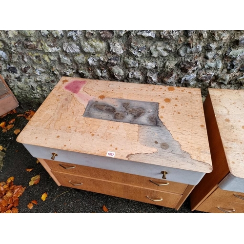 1027 - A pair of mid century oak three drawer chests, by Avalon, 73.5cm high x 78cm wide.