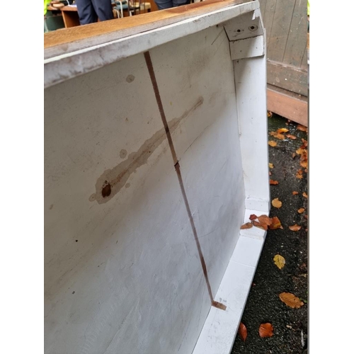 1032 - A white painted kitchen table, missing bolts for legs, 150cm wide x 90cm deep. ... 