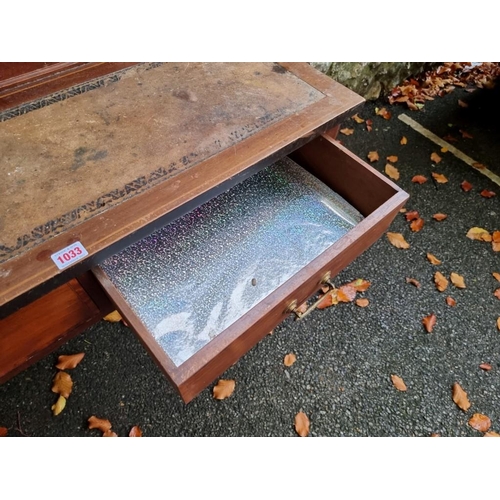 1033 - An old mahogany writing desk, 100cm wide x 53.3cm deep x 90cm high. 