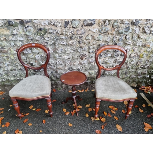 1039 - A pair of mahogany balloon back chairs; together with a small tripod table, 51cm high. ... 