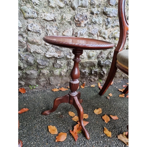 1039 - A pair of mahogany balloon back chairs; together with a small tripod table, 51cm high. ... 