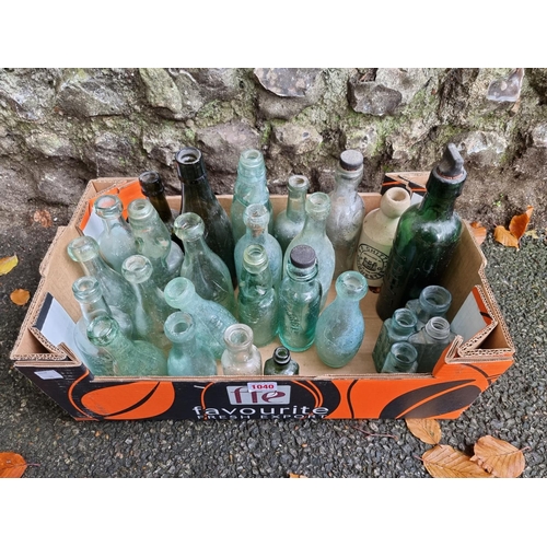 1040 - A quantity of old glass bottles, to include Chichester and Emsworth examples.