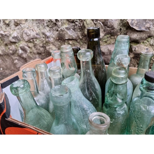 1040 - A quantity of old glass bottles, to include Chichester and Emsworth examples.