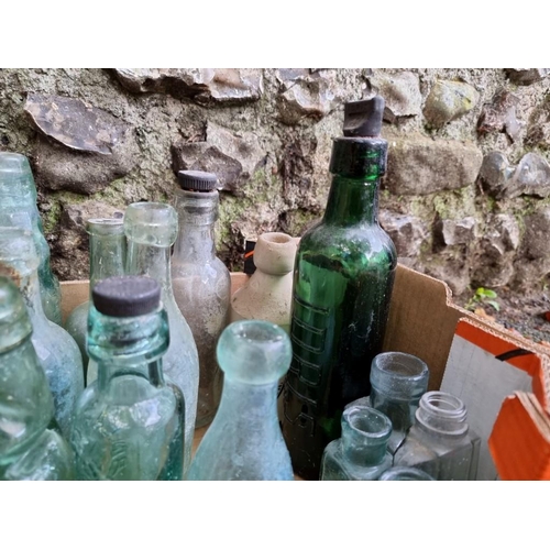 1040 - A quantity of old glass bottles, to include Chichester and Emsworth examples.