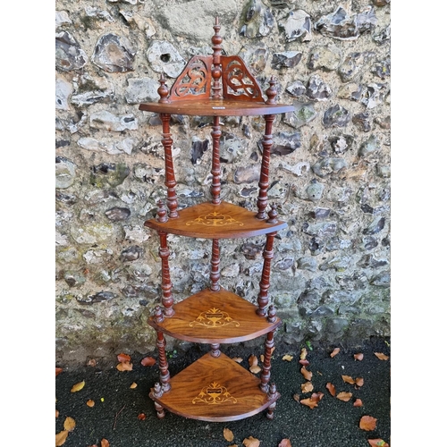 1047 - A four tier inlaid mahogany whatnot, 149cm high. 