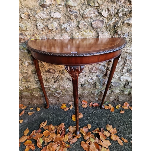 1056 - An inlaid mahogany console table, 66cm wide x 75cm high. 