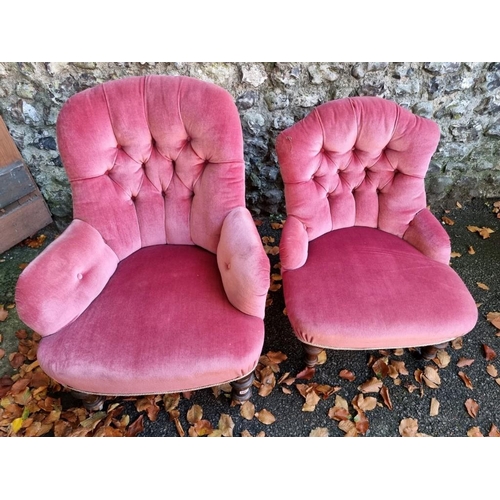 1057 - Two red upholstered nursing chairs. 