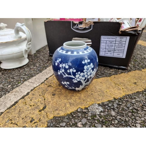 1065 - A blue and white meat plate; together with an oil lamp and other items.