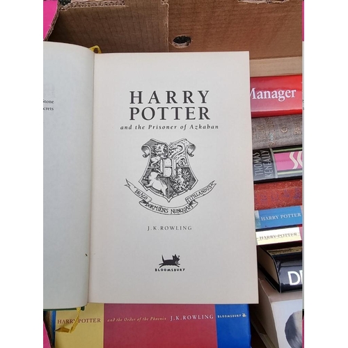 1066 - A quantity of Harry Potter books; together with five other books. 