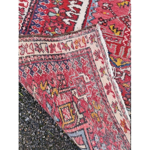 1080 - A Persian runner, having seven central medallions, with floral decoration, 280 x 85cm.... 