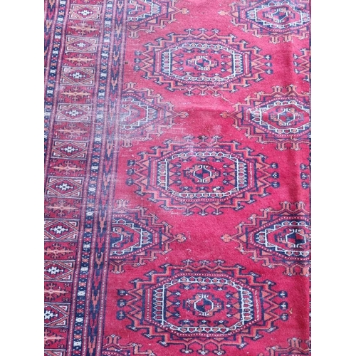 1081 - A square Bokhara rug, having geometric borders, 152 x 124cm. 