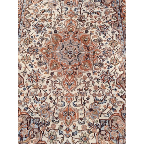 1092 - A Persian rug, having allover floral decoration, 186 x 124cm. 