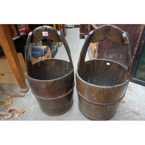 1103 - Two similar Chinese coopered well buckets, 61cm high. (2)