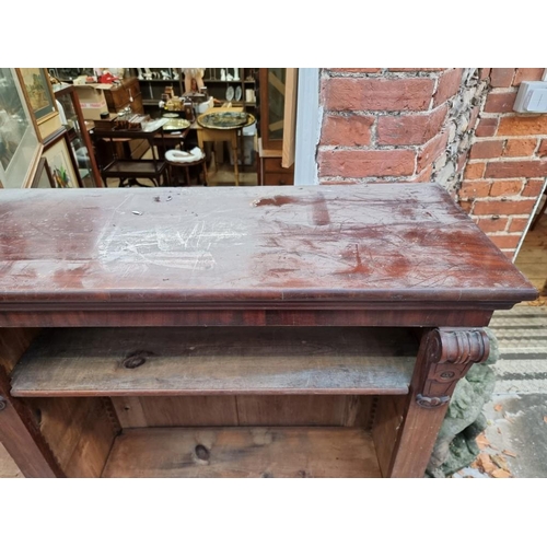 1105 - A large Victorian mahogany open bookcase, 192cm wide.