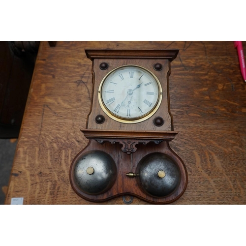 1106 - A Continental walnut postman's alarm wall clock, 29cm high.