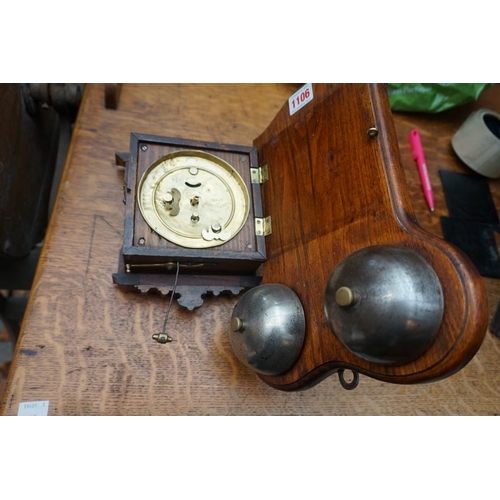 1106 - A Continental walnut postman's alarm wall clock, 29cm high.