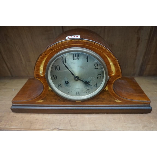 1114 - An early 20th century mahogany and inlaid Wellington clock, 45.5cm wide.