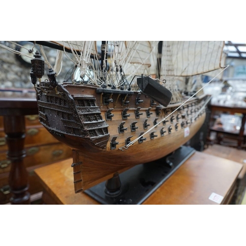 1158 - A wood model of HMS Victory, the hull 69cm long. 