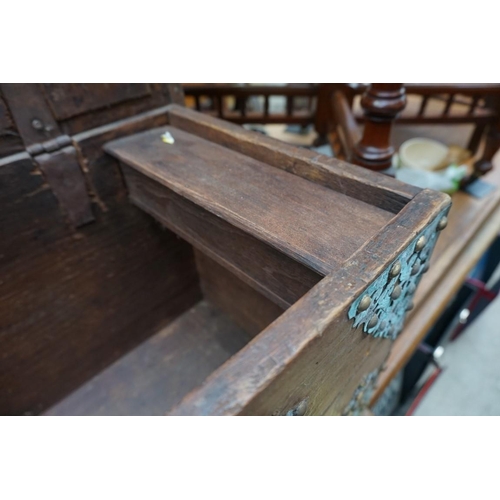 1174 - An Eastern hardwood and brass strapwork coffer, 62cm wide.