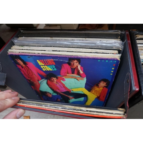 1175 - A collection of 33rpm vinyl records, to include: The Beatles, Rolling Stones, Bob Dylan, etc. in thr... 