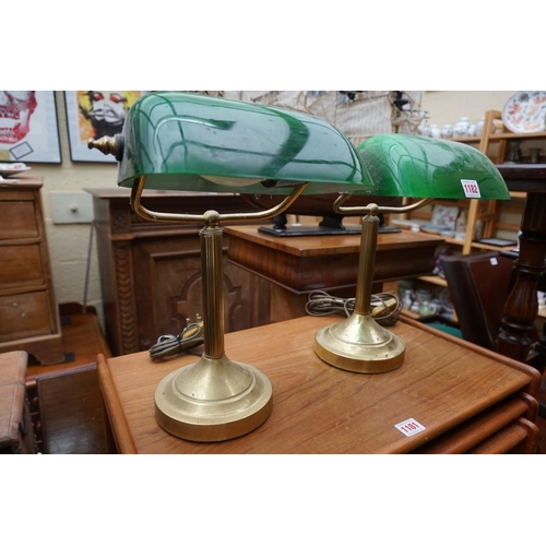 1182 - A pair of brass and green glass desk lamps.