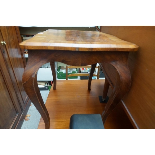 1219 - A walnut low occasional table, 52cm wide.