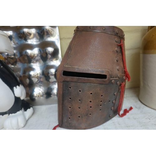 1228 - A reproduction medieval knight's helmet. ... 