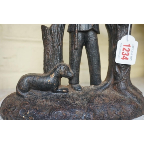 1234 - A Victorian cast iron figural doorstop, 27cm high.