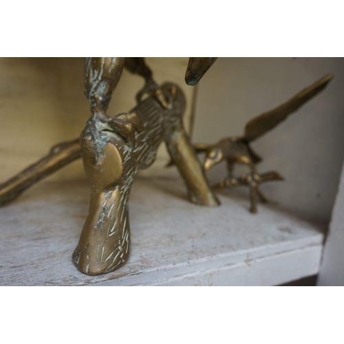 1235 - A large cast brass eagle, wingspan 62cm; together with another smaller example. ... 