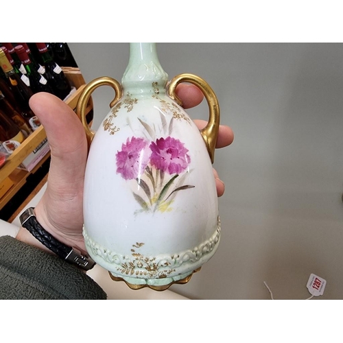 1287 - A pair of Doulton Burslem twin handled vases, each painted with flowers by S Hall, 16cm high.... 