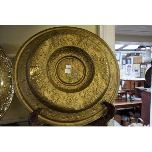 1314 - A brass alms dish, possibly Nuremburg, 17th/18th century, 47cm diameter.