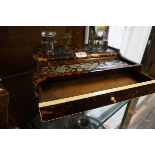 1321 - An early Victorian tortoiseshell and mother of pearl desk stand, 27cm wide.