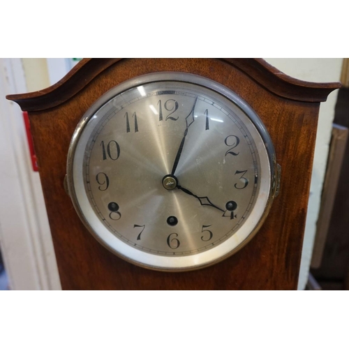 1326 - A 1930s walnut small longcase clock, striking on eight straight gongs, 135.5cm high, with pendulum.... 