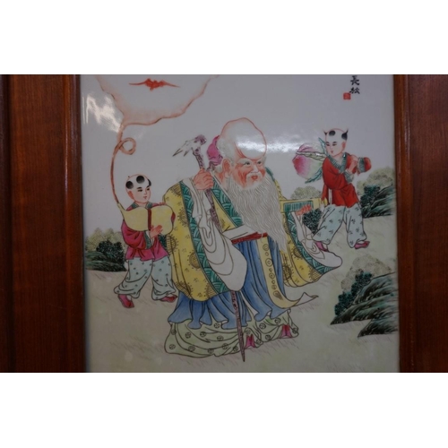 1327 - A Chinese famille rose plaque of Shoulao and two boys, 37.5 x 25cm.