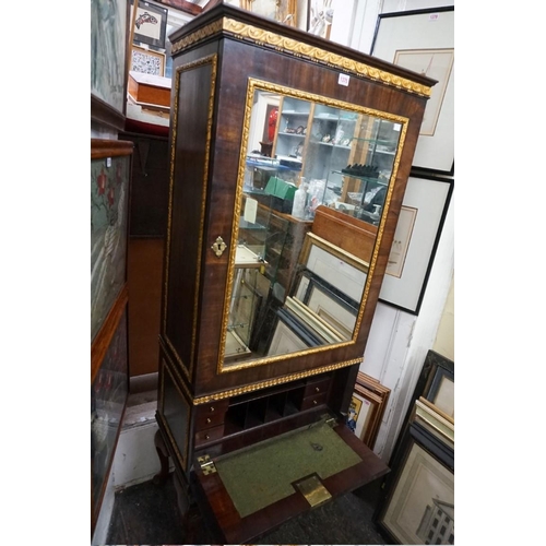 1375 - A mahogany and parcel gilt secretaire bookcase, with mirror panelled door, 67cm wide.... 