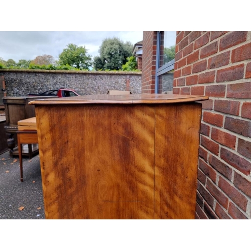 1392 - A 19th century maple chest of drawers, 113.5cm wide, (in two parts). 