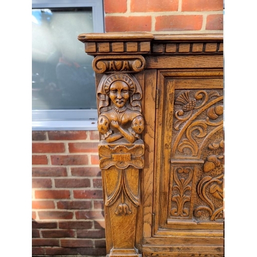 1393 - A good 17th century style carved oak court cupboard, 123cm wide. 